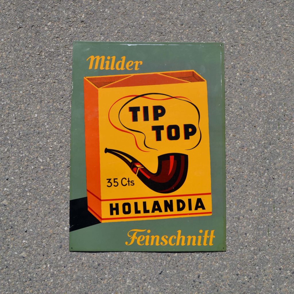 Ceci n'est pas une pipe tôle publicitaire Hollandia Mider Feinschnitt. Panneau publicitaire en tôle imprimée des années 1940. Pour du tabac à fumer.
