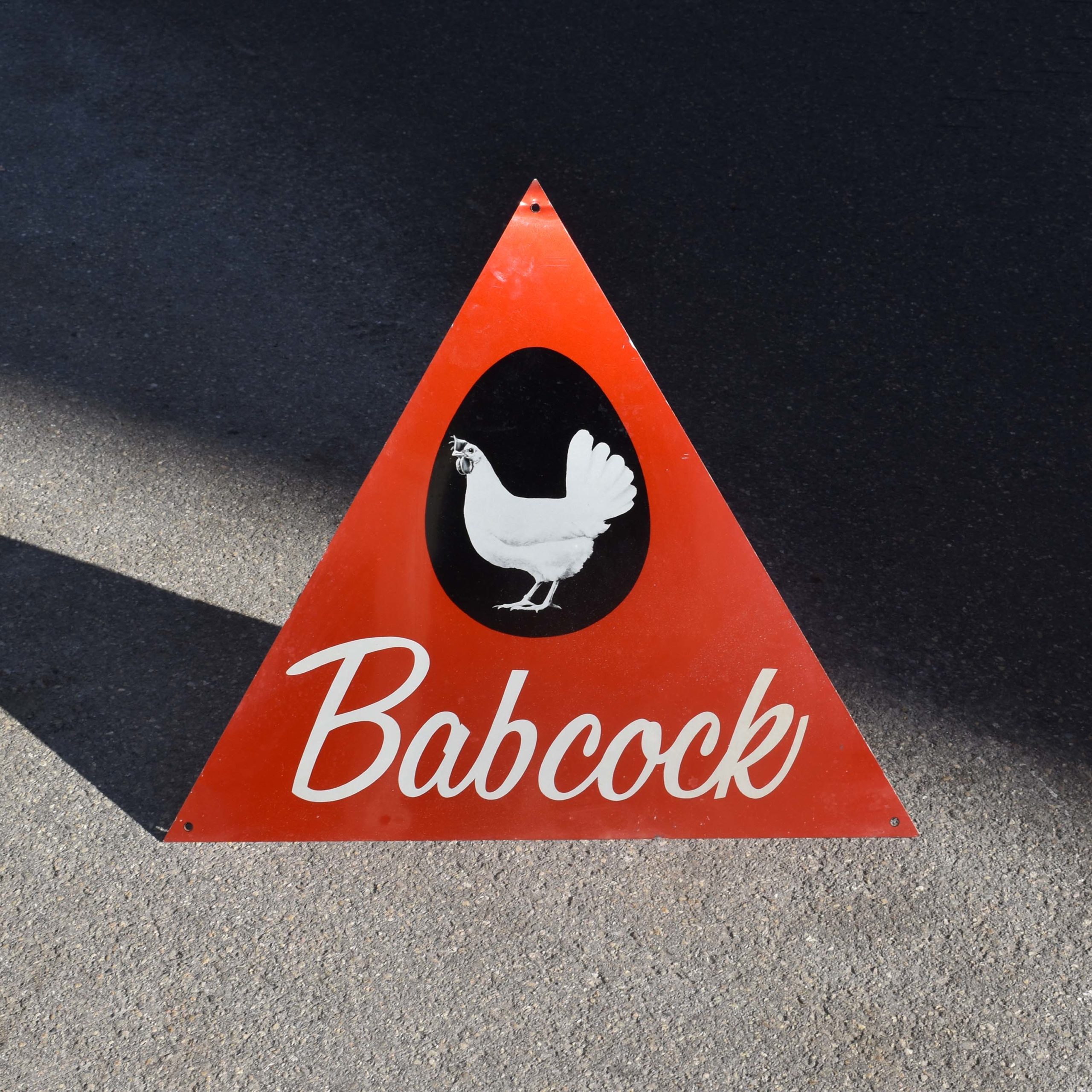Il s’agit d’un plaquette en tôle alu imprimée, pour le label de matériel d’exploitation avicole “Babcock”. Marque américaine.