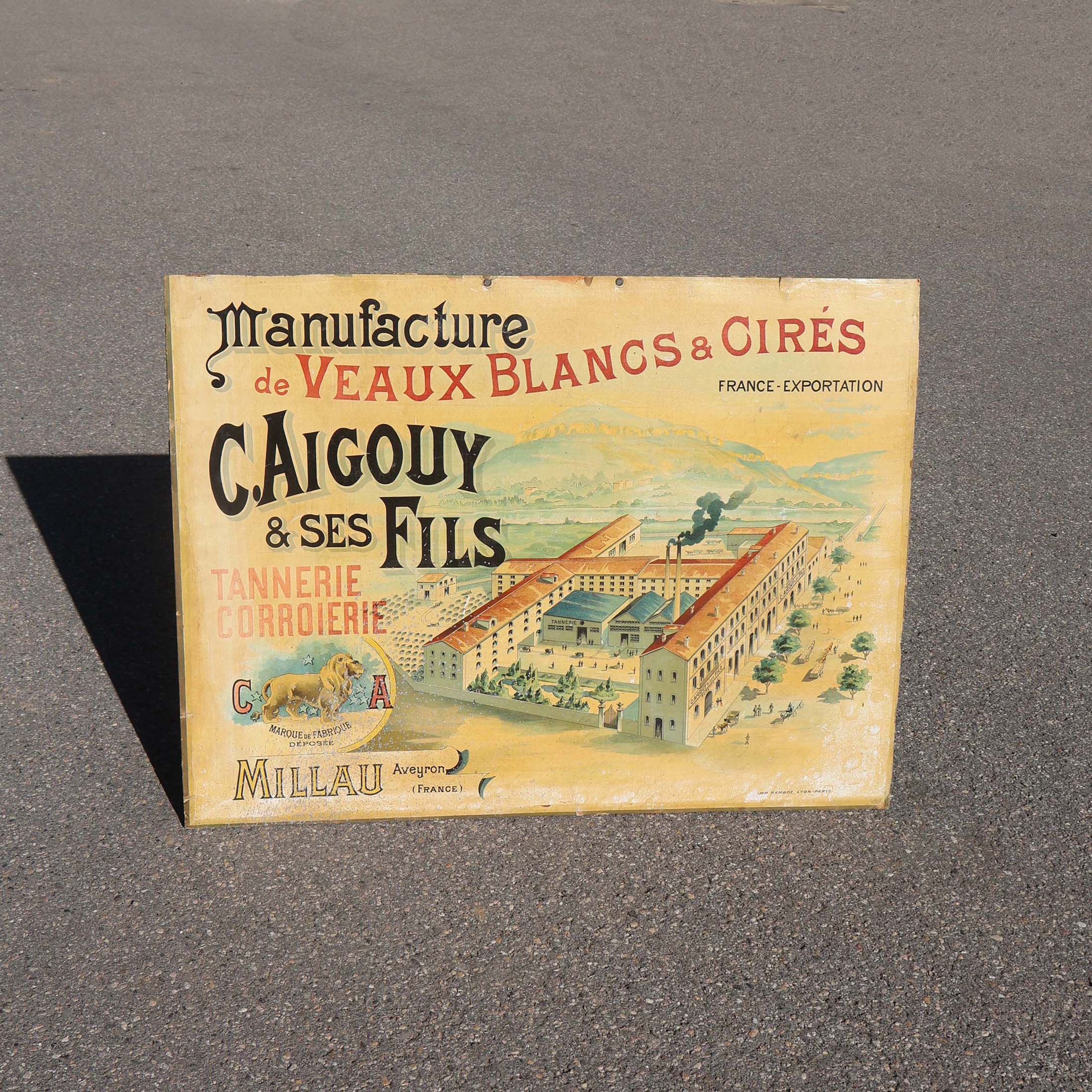 C. Aigouy et ses fils Millau. Manufacture de veaux blancs et cirés. Carton publicitaire ancien.